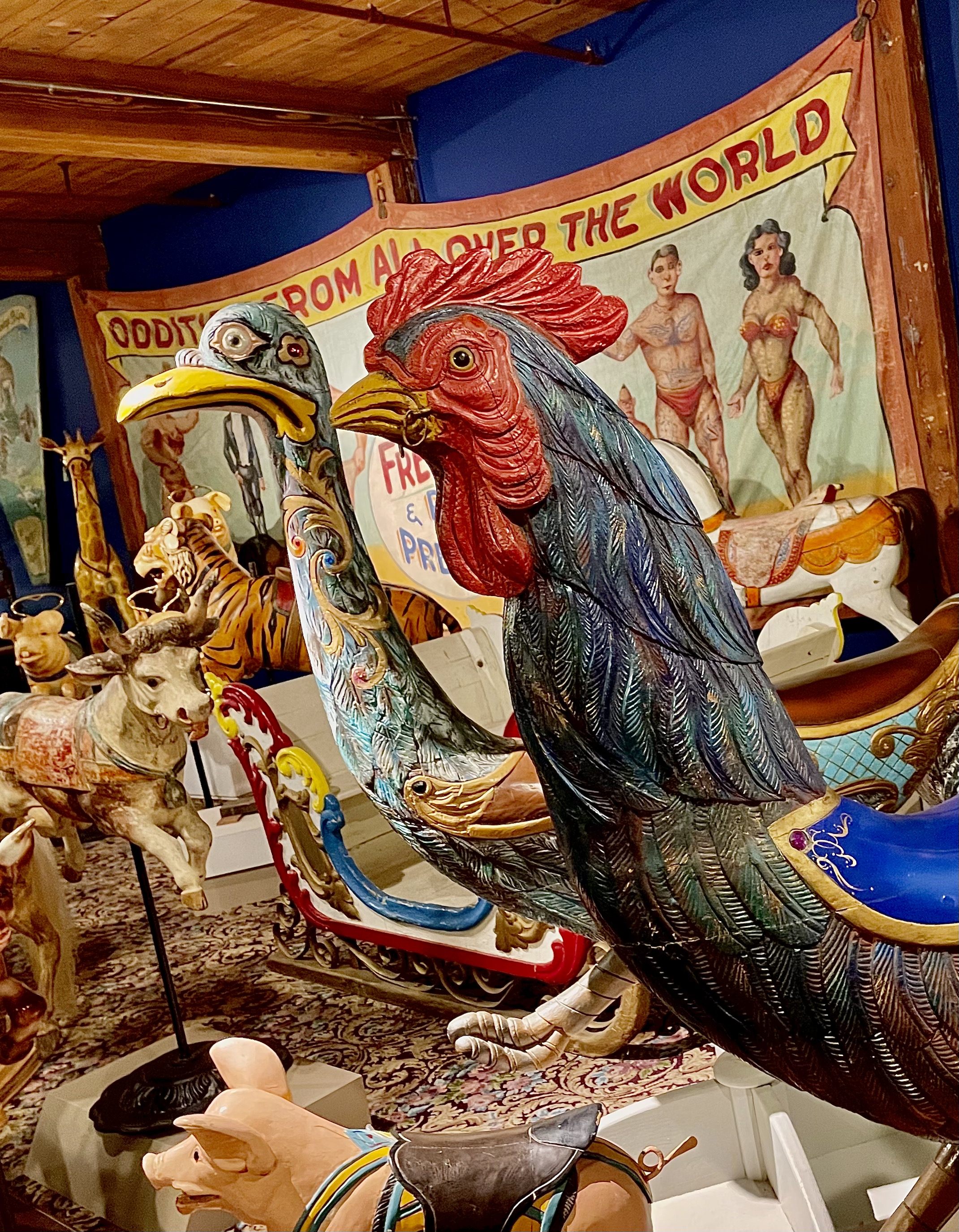 A variety of carousel animals on display at the museum
