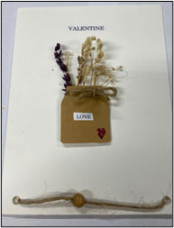 Tiny Valentine's Day card with dried flowers - photo