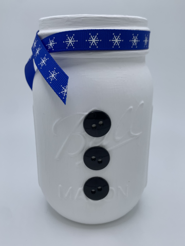 decorative snowman mason jar with three black buttons and a blue scarf