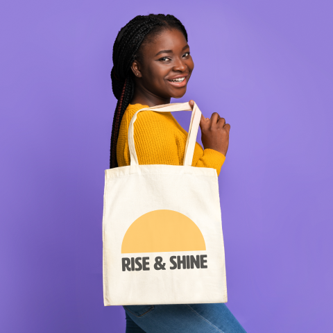 Woman carrying customized tote bag