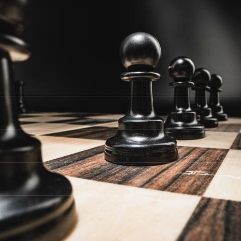 Chess board and pieces up close - Photo