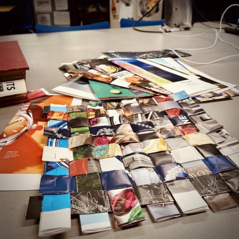 strips of magazine woven together