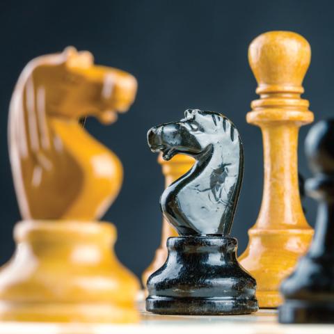 Up close photo of chess pieces