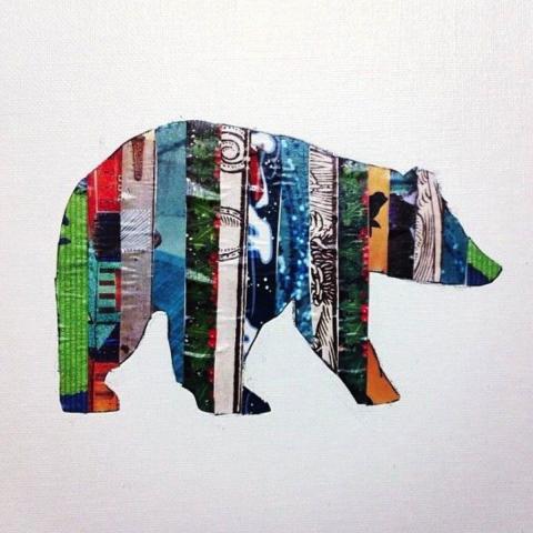 bear crafted with strips of magazine