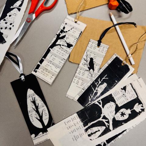 sheet music with bird designs printed on them