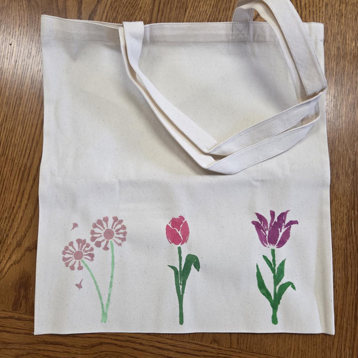 canvas tote bag painted with flowers
