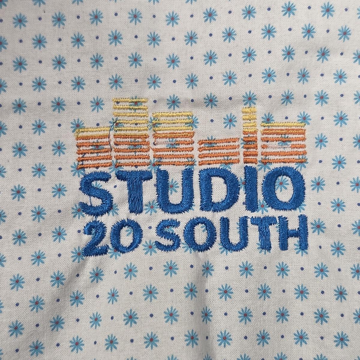 Studio 20 logo in embroidery
